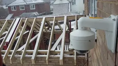 PTZ security camera installed to protect a construction building site